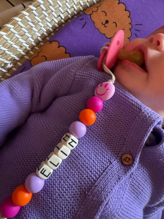 Speenkoord met naam - Elin - roze smiley
