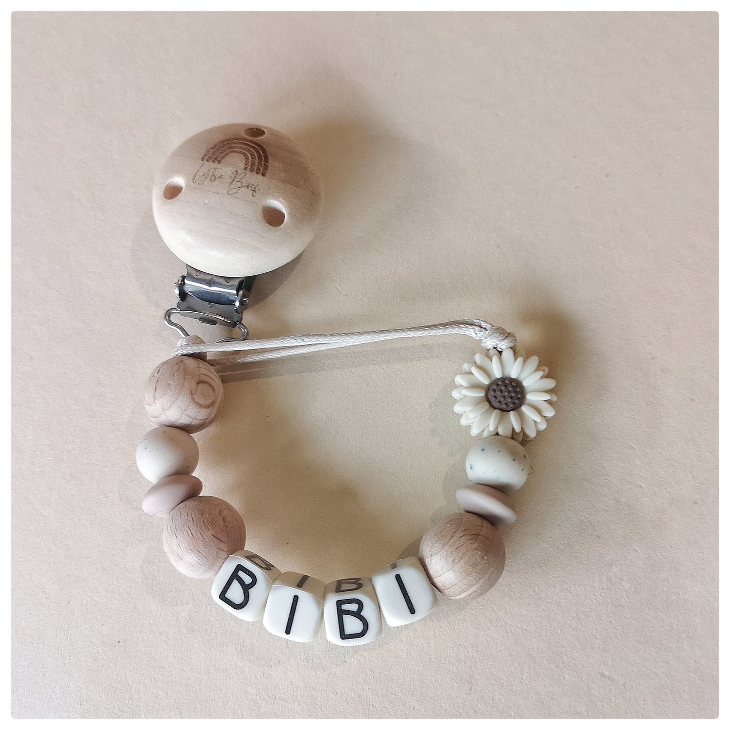 Speenkoord Bloem Ivoor met naam - Bibi